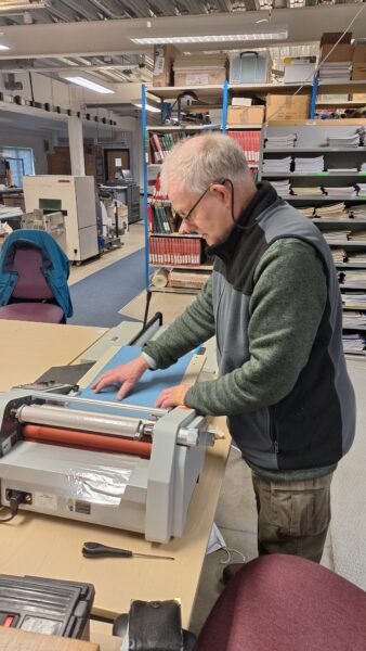 Volunteer laminating cover