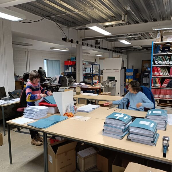 Volunteers binding